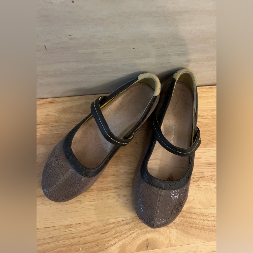 Jambu Muse wedge Mary Jane style shoes in a taupe and dark brown color scheme.
